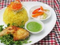 Stired fried rice with chicken in yellow sauce (CÃÂ¡m nghÃ¡Â»â¡ ÃâÃÂ¹i gÃÂ  chiÃÂªn) Royalty Free Stock Photo